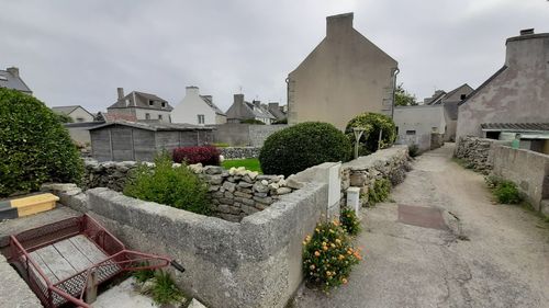 Houses and buildings against sky