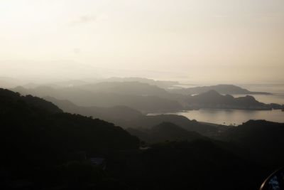 Scenic view of mountains against sky during sunset