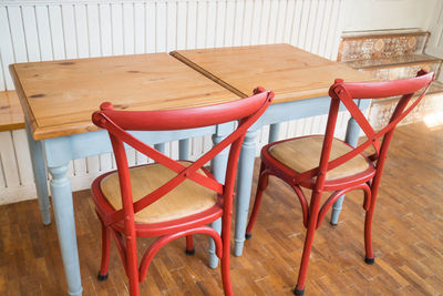 Empty chairs and tables at restaurant