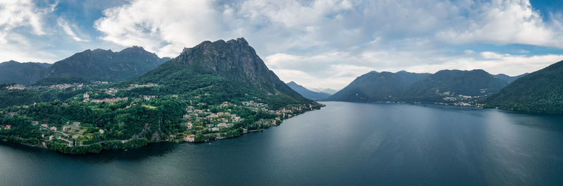 Panoramic view of lake and mountains against sky