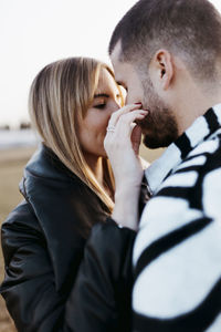 Side view of young man looking away