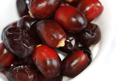 Beautiful red date fruit in white background