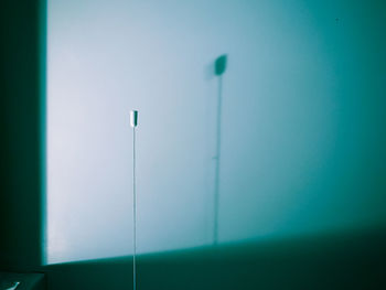 Arrow symbol against clear sky