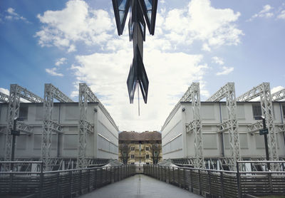 Built structure against cloudy sky