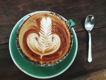 High angle view of cappuccino on table