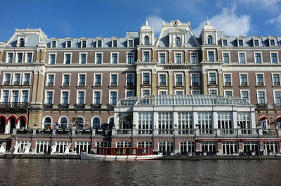 Buildings in city against sky