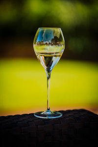 Close-up of wineglass on table