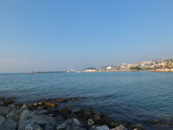 Scenic view of sea against clear sky