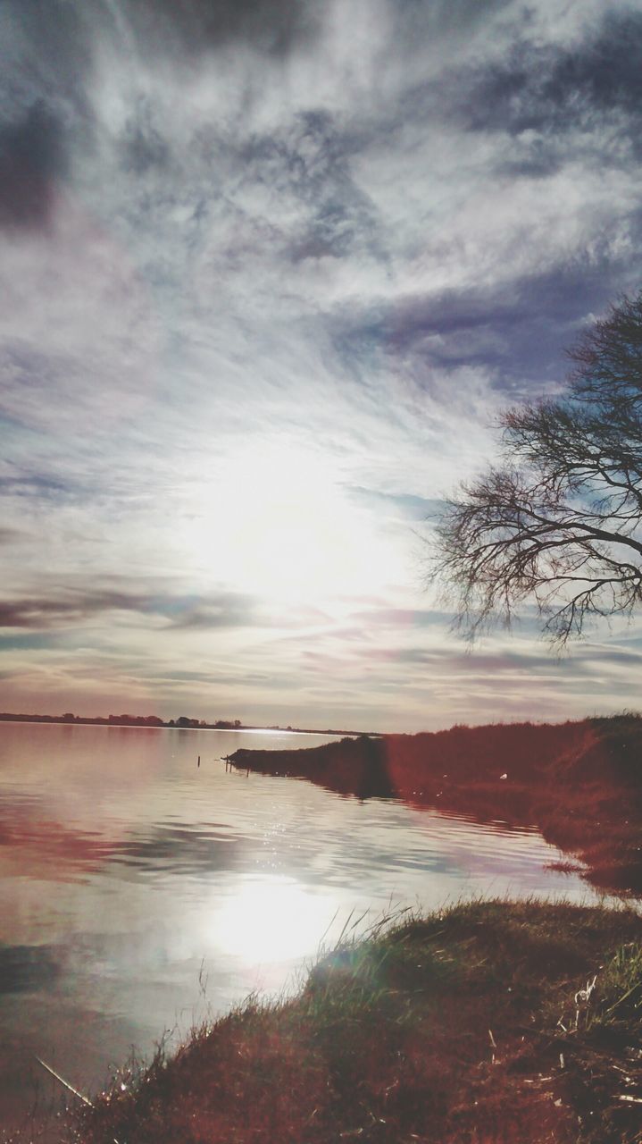 water, sky, tranquil scene, tranquility, scenics, reflection, sunset, lake, cloud - sky, beauty in nature, nature, tree, idyllic, silhouette, cloud, cloudy, river, sun, outdoors, non-urban scene