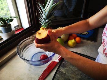 Midsection of man preparing food