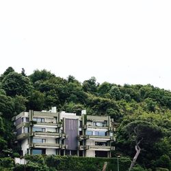 High section of built structures against clear sky