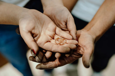 Cropped image of man holding pills