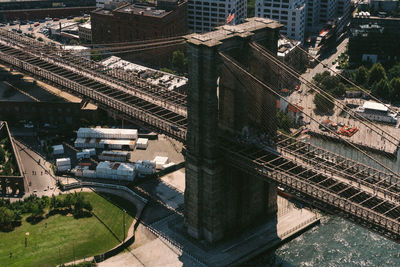 High angle view of railroad tracks amidst buildings in city