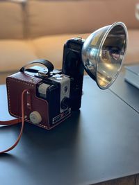 Close-up of camera on table