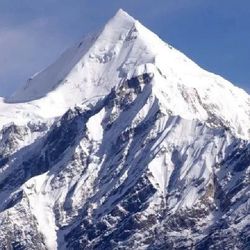 Scenic view of snow covered mountains