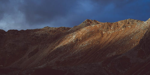 Panoramic view of rocky mountains against sky