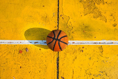 High angle view of basketball on footpath