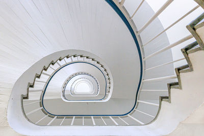 Directly below shot of spiral staircase in building