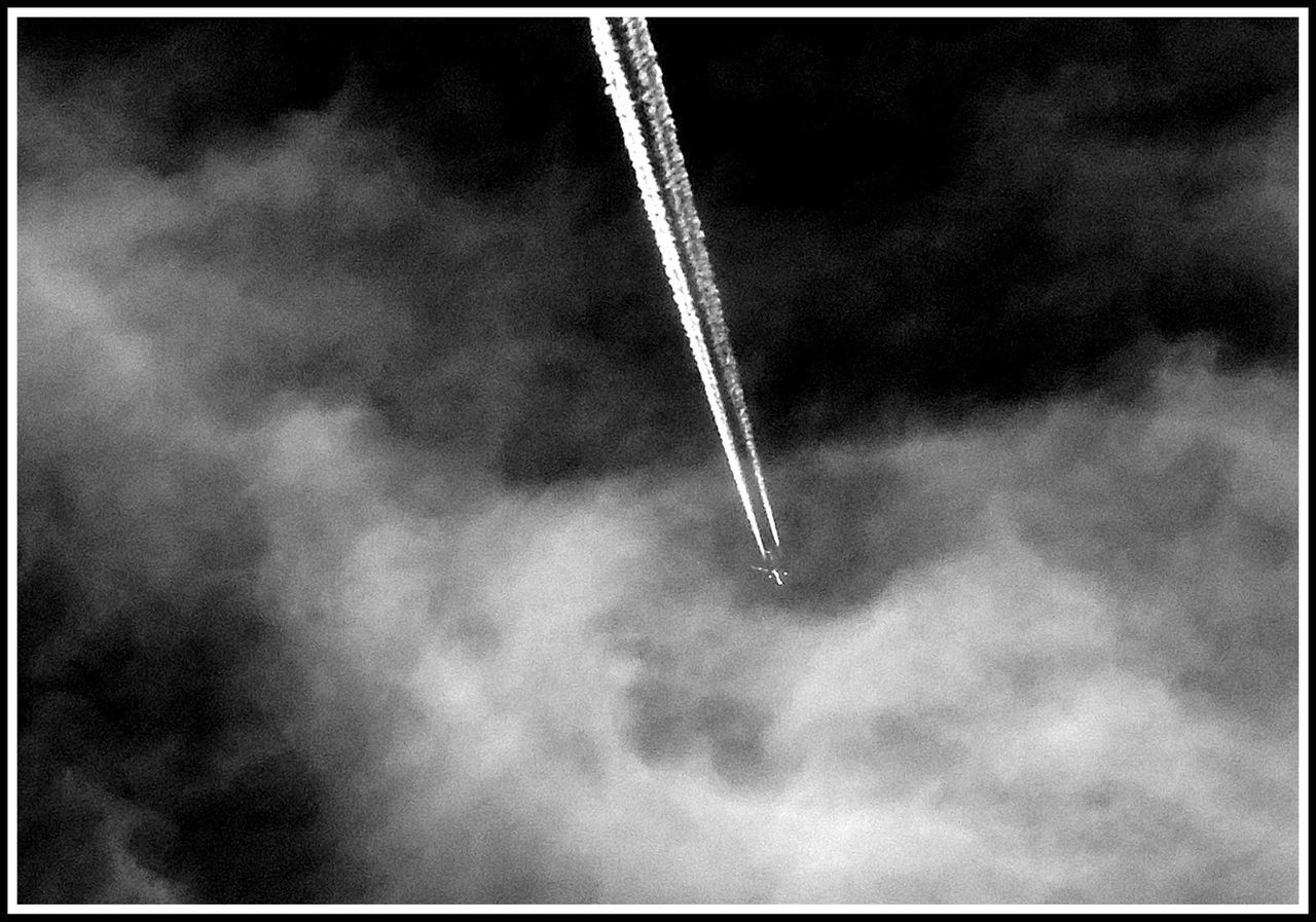 LOW ANGLE VIEW OF AIRPLANE AGAINST SKY