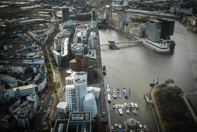 High angle view of rhine river amidst buildings in city