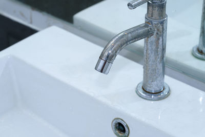 High angle view of faucet in bathroom