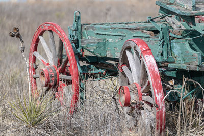 Old rusty bicycle on field