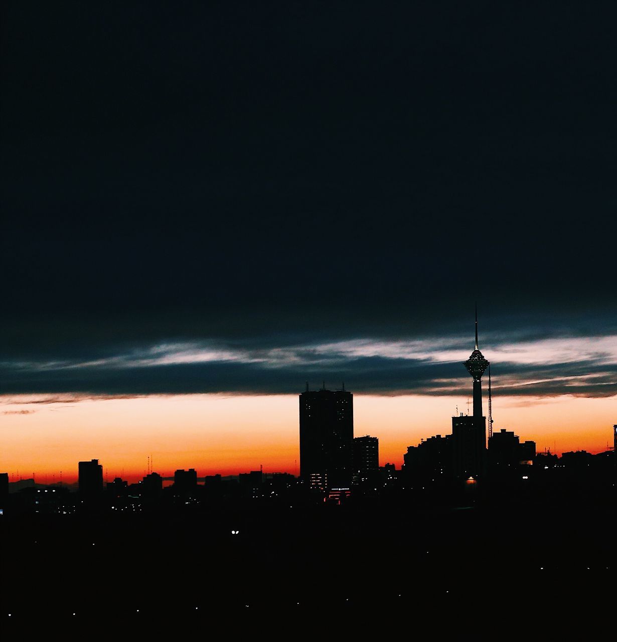 night, built structure, city, architecture, illuminated, building exterior, no people, silhouette, outdoors, cityscape, sky, technology, urban skyline, nature, skyscraper, astronomy