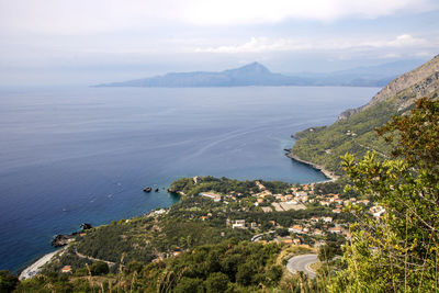 High angle view of bay against sky