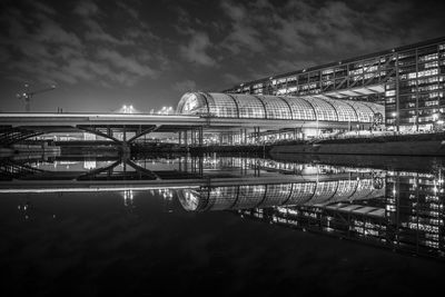 Bridge over city against sky