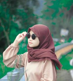 Portrait of girl holding outdoors