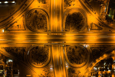 High angle view of light trails on road at night