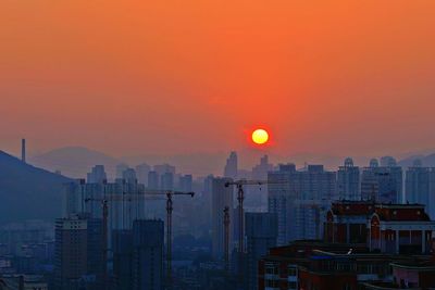 View of cityscape at sunset