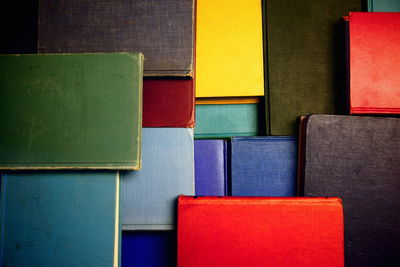 Directly above shot of books arranged on table