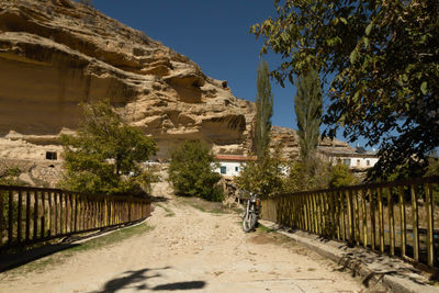 Road leading towards old ruins