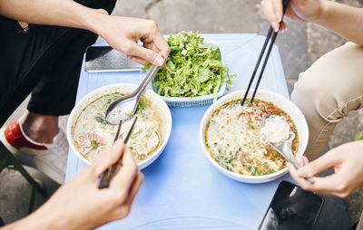 High angle view of couple having food at table