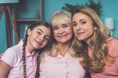 Portrait of cheerful family at home