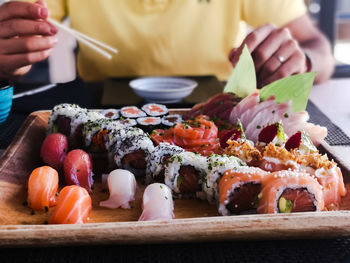 Close-up of sushi served on table