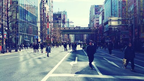 People walking on city street