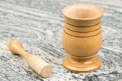 Close-up of wooden container on table