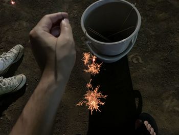 Low section of person preparing food