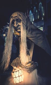 Close-up of horse in mouth at night