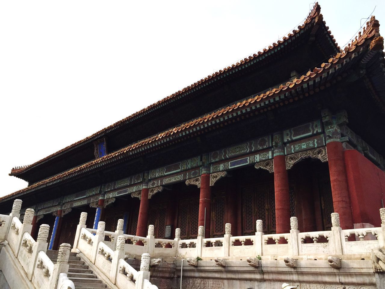 architecture, built structure, clear sky, low angle view, place of worship, building exterior, temple - building, religion, famous place, spirituality, history, tradition, travel destinations, temple, cultures, tourism, roof, travel, architectural column