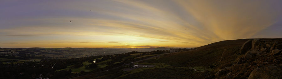 Scenic view of landscape against sky during sunset