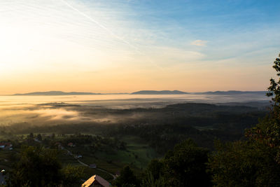 High angle view of landscape against sky during sunset