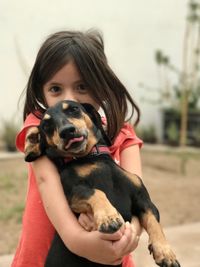 Portrait of girl with dog