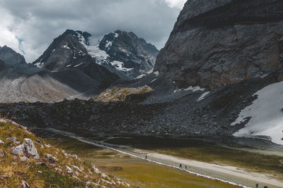 Scenic view of snowcapped mountains against sky