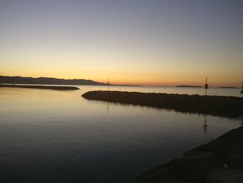 Scenic view of sea at sunset