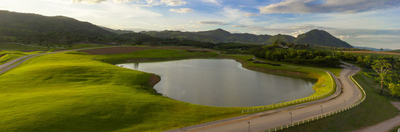 Panoramic view of road amidst mountains against sky