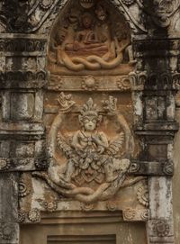 Close-up of buddha statue in temple