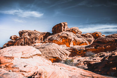 Rock formation on mountain against sky